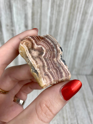 Rhodochrosite Slab from Argentina from Curious Muse Crystals Tagged with crystal, Crystal healing, crystal plate, hide-notify-btn, pink, pink crystal, reiki healing, rhodochrosite, slab, slice