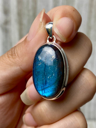 Blue Flash Labradorite in Sterling Silver Pendant from Curious Muse Crystals Tagged with big crystal necklace, blue, blue crystal jewelry, blue labradorite, crystal energy, Crystal Jewelry, full flash lab, Labradorite, Pendant, reiki healing, silver crystal jewel, Sterling, sterling silver