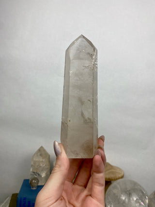 Lemurian Quartz Polished Tower | Wispy Inclusions | Six Side Generator from Curious Muse Crystals Tagged with clear, clear brazil quartz, clear quartz, Crown crystal, hide-notify-btn, lemurian, lemurian generator, Lemurian Quartz, lemurian seed, quartz, rainbow, sunset mine, tower