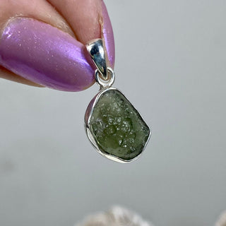Moldavite in Sterling Silver Pendant | Genuine Tektite from Czech Republic from Curious Muse Crystals Tagged with clear, Crown crystal, crystal jewelry, genuine tektite, green, hide-notify-btn, moldavite, natural moldavite, sterling silver, tektite, Third eye stone, transformation
