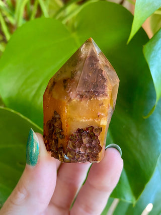 Dreamcoat Lemurian Generator - Semi-Polished Brazilian Tower Crystal from Curious Muse Crystals Tagged with clear, clear brazil quartz, dreamcoat lemurian, goethite rutile, hematite amethyst, hide-notify-btn, lemurian, lemurian generator, lemurian seed, purple, red, secondary growth, super seven, synergy seven, yellow