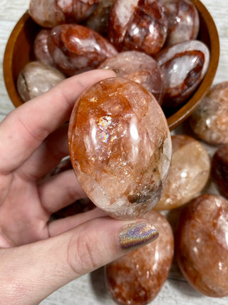 Hematite in Quartz Palm Stone from Curious Muse Crystals Tagged with carving, clear, crystal, hematite, hematite red quartz, hematoid quartz, orange, palm stone, palmstone, polished, quartz