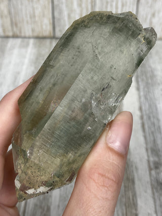 Nirvana Quartz with Green Chlorite Double Terminated Point | High-Altitude Himalayan Crystal from Curious Muse Crystals Tagged with chlorite inclusion, clear, green, green Quartz, hand mined crystal, hide-notify-btn, high altitude quartz, High vibration stone, Himalayan Quartz, manifesting Quartz, Nirvana Quartz
