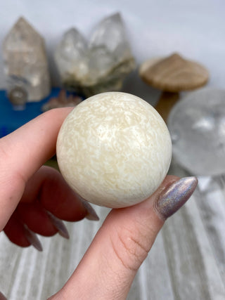 Scolecite Sphere from Curious Muse Crystals Tagged with crystal sphere, fine mineral, india, quartz, scolecite, sphere, zeolite