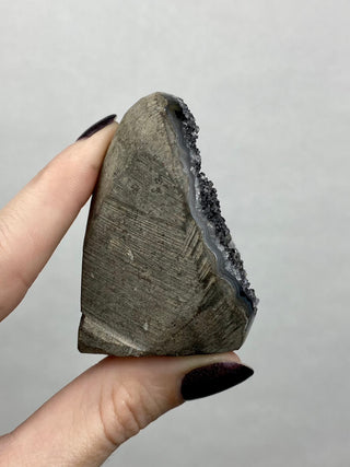Black Galaxy Amethyst Cut Base | Brazil from Curious Muse Crystals Tagged with amethyst, black, cut base amethyst, extra dark amethyst, goethite amethyst, hematite amethyst, hide-notify-btn, purple, raw, unique amethyst