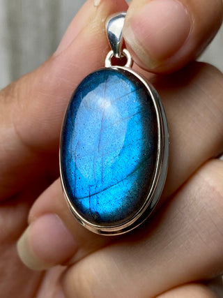 Blue Flash Labradorite in Sterling Silver Pendant from Curious Muse Crystals Tagged with big crystal necklace, blue, blue crystal jewelry, blue labradorite, crystal energy, Crystal Jewelry, full flash lab, Labradorite, Pendant, reiki healing, silver crystal jewel, Sterling, sterling silver