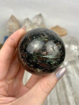 Astrophyllite with Garnet Sphere from Curious Muse Crystals Tagged with astrophyllite, black, blue, garnet, gold, hide-notify-btn, high quality, red, sphere