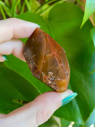 Dreamcoat Lemurian Generator - Polished Brazilian Tower Crystal from Curious Muse Crystals Tagged with clear, clear brazil quartz, dreamcoat lemurian, goethite rutile, hematite amethyst, hide-notify-btn, lemurian, lemurian generator, lemurian seed, polished, purple, red, secondary growth, super seven, synergy seven, tower, yellow