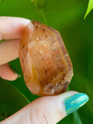 Dreamcoat Lemurian Generator - Polished Brazilian Tower Crystal from Curious Muse Crystals Tagged with clear, clear brazil quartz, dreamcoat lemurian, goethite rutile, hematite amethyst, hide-notify-btn, lemurian, lemurian generator, lemurian seed, polished, purple, red, secondary growth, super seven, synergy seven, tower, yellow