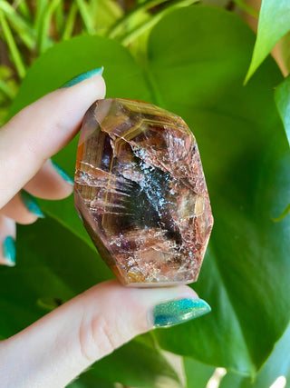 Dreamcoat Lemurian Generator - Polished Brazilian Tower Crystal from Curious Muse Crystals Tagged with clear, clear brazil quartz, dreamcoat lemurian, goethite rutile, hematite amethyst, hide-notify-btn, lemurian, lemurian generator, lemurian seed, polished, purple, red, secondary growth, super seven, synergy seven, tower, yellow