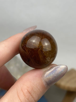 Rutile Sphere - High Grade Red and Gold Rutilated Quartz from Curious Muse Crystals Tagged with Brazilian Quartz, clear quartz, crystal energy, crystal sphere, hide-notify-btn, inclusion quartz, quartz, reiki healing, rutile, sphere