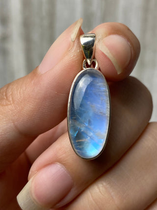 Rainbow Moonstone in Sterling Silver Pendant from Curious Muse Crystals Tagged with big crystal necklace, blue, blue crystal jewelry, blue moonstone, crystal energy, Crystal Jewelry, moonstone, natural moonstone, Pendant, rainbow moonstone, reiki healing, silver crystal jewel, Sterling, sterling silver