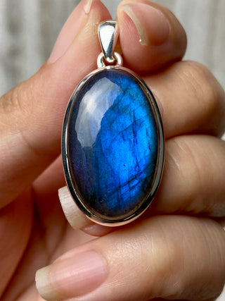 Blue Flash Labradorite in Sterling Silver Pendant from Curious Muse Crystals Tagged with big crystal necklace, blue, blue crystal jewelry, blue labradorite, crystal energy, Crystal Jewelry, full flash lab, Labradorite, Pendant, reiki healing, silver crystal jewel, Sterling, sterling silver
