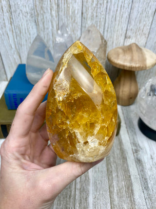 Hematite in Brazilian Quartz Flame | Stunning Inclusions from Curious Muse Crystals Tagged with carving, clear, crystal, hematite, hematite red quartz, hematoid quartz, hide-notify-btn, orange, polished, quartz, yellow