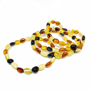 Amber Stretch Bracelet | Tricolor Coin Bead from Curious Muse Crystals Tagged with amber, bracelet, brown, crystal bracelet, Crystal healing, crystal jewelry, fine mineral, fossil, fossilized amber, gemstone bracelet, genuine crystal, mineral specimen, real amber, stretch bracelet