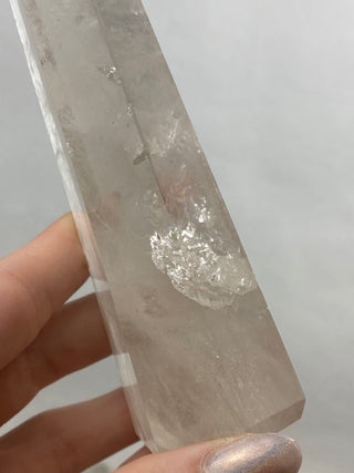 Lemurian Quartz Polished Tower | Wispy Inclusions | Six Side Generator from Curious Muse Crystals Tagged with clear, clear brazil quartz, clear quartz, Crown crystal, hide-notify-btn, lemurian, lemurian generator, Lemurian Quartz, lemurian seed, quartz, rainbow, sunset mine, tower