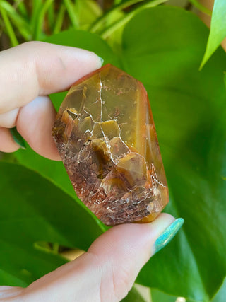 Dreamcoat Lemurian Generator - Polished Brazilian Tower Crystal from Curious Muse Crystals Tagged with clear, clear brazil quartz, dreamcoat lemurian, goethite rutile, hematite amethyst, hide-notify-btn, lemurian, lemurian generator, lemurian seed, polished, purple, red, secondary growth, super seven, synergy seven, tower, yellow