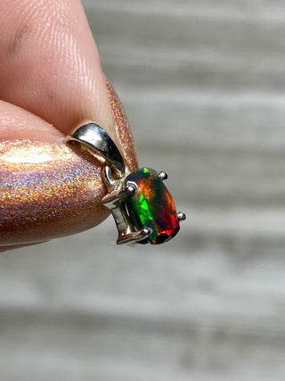 Black Opal in Sterling Silver Pendant from Curious Muse Crystals Tagged with black opal, crystal healing, Crystal Jewelry, energy work, flashy opal, hide-notify-btn, opal, opal crystal pendant, reiki crystal, Sterling, sterling silver, witchy jewelry