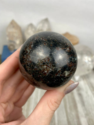 Astrophyllite with Garnet Sphere from Curious Muse Crystals Tagged with astrophyllite, black, blue, garnet, gold, hide-notify-btn, high quality, red, sphere