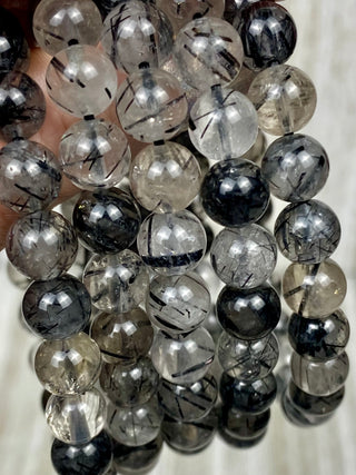 Tourmaline in Quartz 8mm Round Bead Crystal Bracelet from Curious Muse Crystals Tagged with 8mm beads, black, bracelet, clear, crystal jewelry, gemstone bead, gemstone jewelry, healing jewelry, inclusion quartz, tourmaline