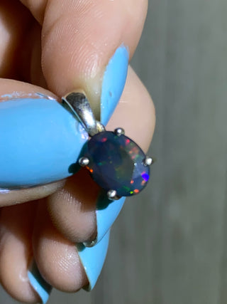 Black Opal in Sterling Silver Pendant from Curious Muse Crystals Tagged with black opal, crystal healing, Crystal Jewelry, energy work, flashy opal, hide-notify-btn, opal, opal crystal pendant, reiki crystal, Sterling, sterling silver, witchy jewelry