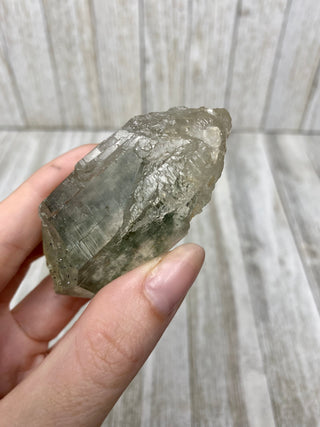 Nirvana Quartz Self Healed Double Termination with Green Chlorite | High-Altitude Himalayan Crystal from Curious Muse Crystals Tagged with chlorite inclusion, clear, green, green Quartz, hand mined crystal, hide-notify-btn, high altitude quartz, High vibration stone, Himalayan Quartz, manifesting Quartz, Nirvana Quartz