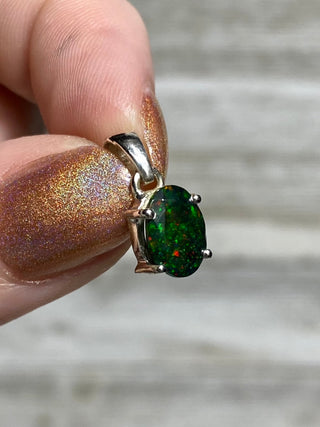 Black Opal in Sterling Silver Pendant from Curious Muse Crystals Tagged with black opal, crystal healing, Crystal Jewelry, energy work, flashy opal, hide-notify-btn, opal, opal crystal pendant, reiki crystal, Sterling, sterling silver, witchy jewelry