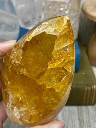 Hematite in Brazilian Quartz Flame | Stunning Inclusions from Curious Muse Crystals Tagged with carving, clear, crystal, hematite, hematite red quartz, hematoid quartz, hide-notify-btn, orange, polished, quartz, yellow