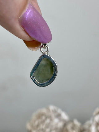 Moldavite in Sterling Silver Pendant | Genuine Tektite from Czech Republic from Curious Muse Crystals Tagged with clear, Crown crystal, crystal jewelry, genuine tektite, green, hide-notify-btn, moldavite, natural moldavite, sterling silver, tektite, Third eye stone, transformation