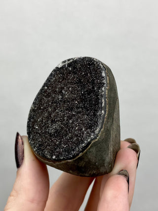 Black Galaxy Amethyst Cut Base | Brazil from Curious Muse Crystals Tagged with amethyst, black, cut base amethyst, extra dark amethyst, goethite amethyst, hematite amethyst, hide-notify-btn, purple, raw, unique amethyst