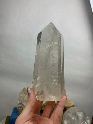 Lemurian Quartz Polished Tower | Rainbow Inclusions | Six Side Generator from Curious Muse Crystals Tagged with clear, clear brazil quartz, clear quartz, Crown crystal, hide-notify-btn, lemurian, lemurian generator, Lemurian Quartz, lemurian seed, quartz, rainbow, sunset mine, tower