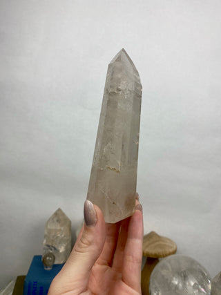 Lemurian Quartz Polished Tower | Wispy Inclusions | Six Side Generator from Curious Muse Crystals Tagged with clear, clear brazil quartz, clear quartz, Crown crystal, hide-notify-btn, lemurian, lemurian generator, Lemurian Quartz, lemurian seed, quartz, rainbow, sunset mine, tower
