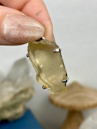 Libyan Desert Glass in Sterling Silver Pendant from Curious Muse Crystals Tagged with desert glass, hide-notify-btn, libya, necklace, Pendant, sterling silver, tektite, yellow