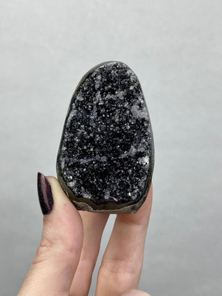Black Galaxy Amethyst Cut Base | Brazil from Curious Muse Crystals Tagged with amethyst, black, cut base amethyst, extra dark amethyst, goethite amethyst, hematite amethyst, hide-notify-btn, purple, raw, unique amethyst