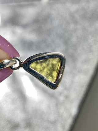 Moldavite in Sterling Silver Pendant | Genuine Tektite from Czech Republic from Curious Muse Crystals Tagged with clear, Crown crystal, crystal jewelry, genuine tektite, green, hide-notify-btn, moldavite, natural moldavite, sterling silver, tektite, Third eye stone, transformation