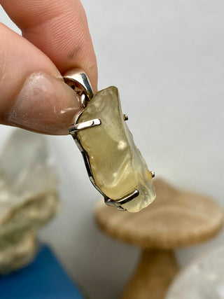 Libyan Desert Glass in Sterling Silver Pendant from Curious Muse Crystals Tagged with desert glass, hide-notify-btn, libya, necklace, Pendant, sterling silver, tektite, yellow
