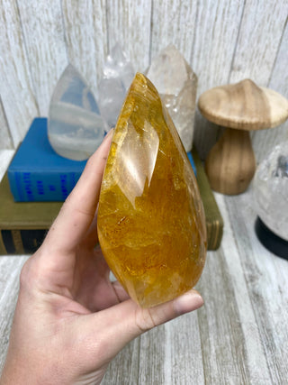 Hematite in Brazilian Quartz Flame | Stunning Inclusions from Curious Muse Crystals Tagged with carving, clear, crystal, hematite, hematite red quartz, hematoid quartz, hide-notify-btn, orange, polished, quartz, yellow
