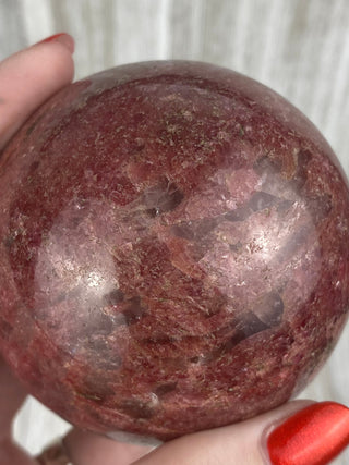 Rhodonite Sphere from Madagascar from Curious Muse Crystals Tagged with crystal, crystal energy, crystal sphere, hide-notify-btn, madagascar, palm stone, palmstone, pink, polished, red, reiki healing, Rhodonite, sphere