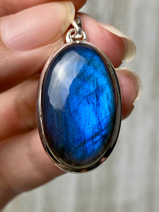 Blue Flash Labradorite in Sterling Silver Pendant from Curious Muse Crystals Tagged with big crystal necklace, blue, blue crystal jewelry, blue labradorite, crystal energy, Crystal Jewelry, full flash lab, Labradorite, Pendant, reiki healing, silver crystal jewel, Sterling, sterling silver