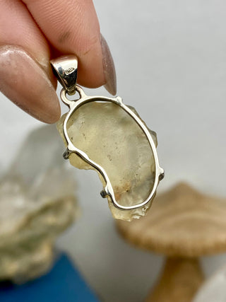 Libyan Desert Glass in Sterling Silver Pendant from Curious Muse Crystals Tagged with desert glass, hide-notify-btn, libya, necklace, Pendant, sterling silver, tektite, yellow