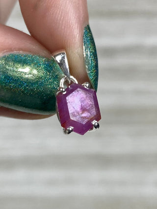 Ruby Facet in Sterling Silver Pendant from Curious Muse Crystals Tagged with asterism, corundum, crystal healing, Crystal Jewelry, energy work, hide-notify-btn, pink, red, ruby, Sterling, sterling silver