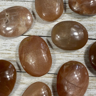 Sunstone with Moonstone Flashy Palm Stone from Curious Muse Crystals Tagged with Feldspar, moonstone, orange, orthoclase, orthoclase feldspar, palm stone, palmstone, sunstone