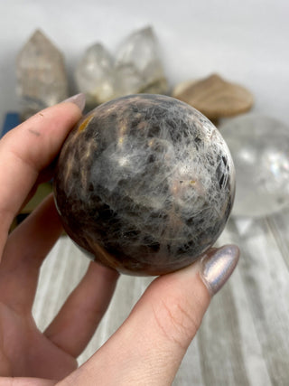 Black Moonstone Sphere | Flashy Orthoclase from Curious Muse Crystals Tagged with black, black moonstone, Crystal healing, genuine crystal, hide-notify-btn, moonstone, orthoclase, silver, sphere