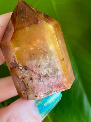 Dreamcoat Lemurian Generator - Semi-Polished Brazilian Tower Crystal from Curious Muse Crystals Tagged with clear, clear brazil quartz, dreamcoat lemurian, goethite rutile, hematite amethyst, hide-notify-btn, lemurian, lemurian generator, lemurian seed, purple, red, secondary growth, super seven, synergy seven, yellow