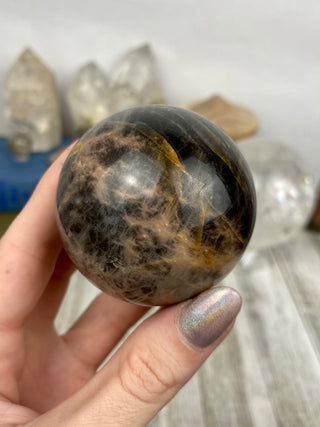 Black Moonstone Sphere | Flashy Orthoclase from Curious Muse Crystals Tagged with black, black moonstone, Crystal healing, genuine crystal, hide-notify-btn, moonstone, orthoclase, silver, sphere