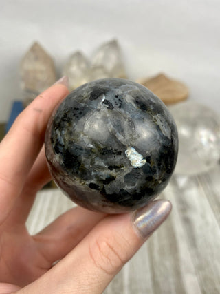 Larvikite Sphere from Curious Muse Crystals Tagged with black, crystal sphere, Feldspar, Grey, larvikite, sphere