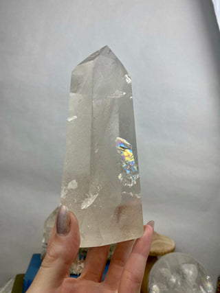 Lemurian Quartz Polished Tower | Rainbow Inclusions | Six Side Generator from Curious Muse Crystals Tagged with clear, clear brazil quartz, clear quartz, Crown crystal, hide-notify-btn, lemurian, lemurian generator, Lemurian Quartz, lemurian seed, quartz, rainbow, sunset mine, tower