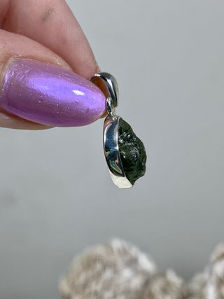 Moldavite in Sterling Silver Pendant | Genuine Tektite from Czech Republic from Curious Muse Crystals Tagged with clear, Crown crystal, crystal jewelry, genuine tektite, green, hide-notify-btn, moldavite, natural moldavite, sterling silver, tektite, Third eye stone, transformation