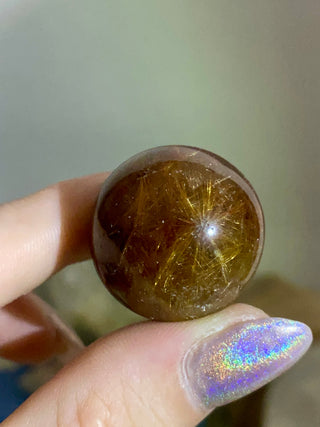 Rutile Sphere - High Grade Red and Gold Rutilated Quartz from Curious Muse Crystals Tagged with Brazilian Quartz, clear quartz, crystal energy, crystal sphere, hide-notify-btn, inclusion quartz, quartz, reiki healing, rutile, sphere