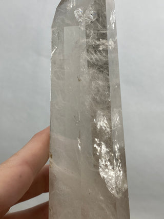 Lemurian Quartz Polished Tower | Wispy Inclusions | Six Side Generator from Curious Muse Crystals Tagged with clear, clear brazil quartz, clear quartz, Crown crystal, hide-notify-btn, lemurian, lemurian generator, Lemurian Quartz, lemurian seed, quartz, rainbow, sunset mine, tower